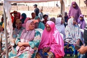 Widow supported by Catherine Adeh Foundation receiving economic empowerment aid in Nigeria